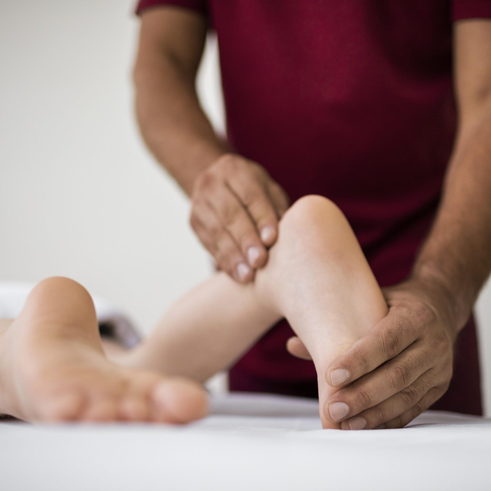 osteopathy-patoient-getting-tretment-massage (2)